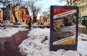 Одесса преображается: тротуары и улицы стали снежной кашей (ФОТО)